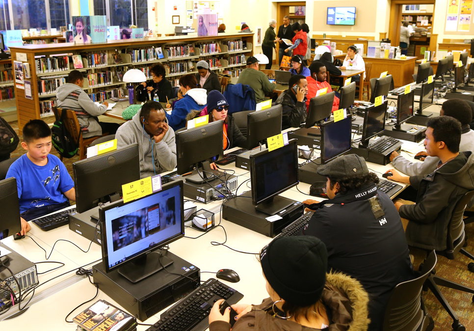 Library patrons in the public computer area at the Columbia Branch