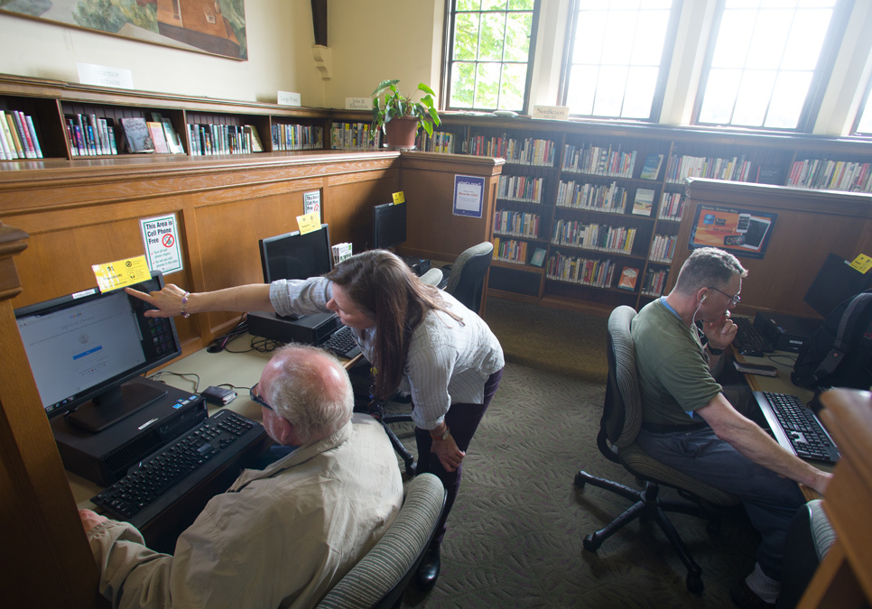 Library patrons using public computers at the Fremont Branch