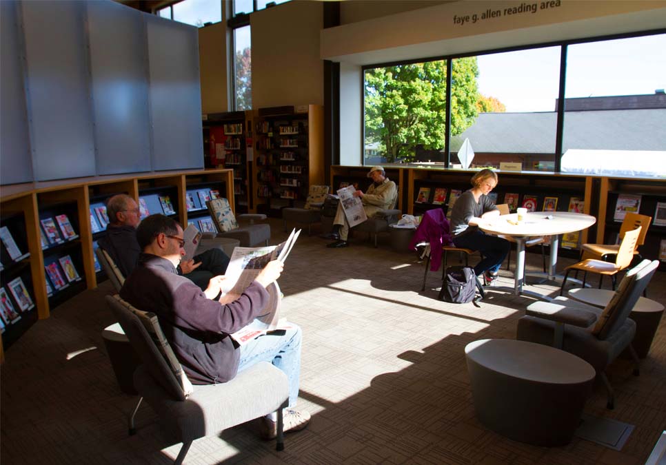 Library patrons in the Fay Allen Reading Room at the Northeast Branch