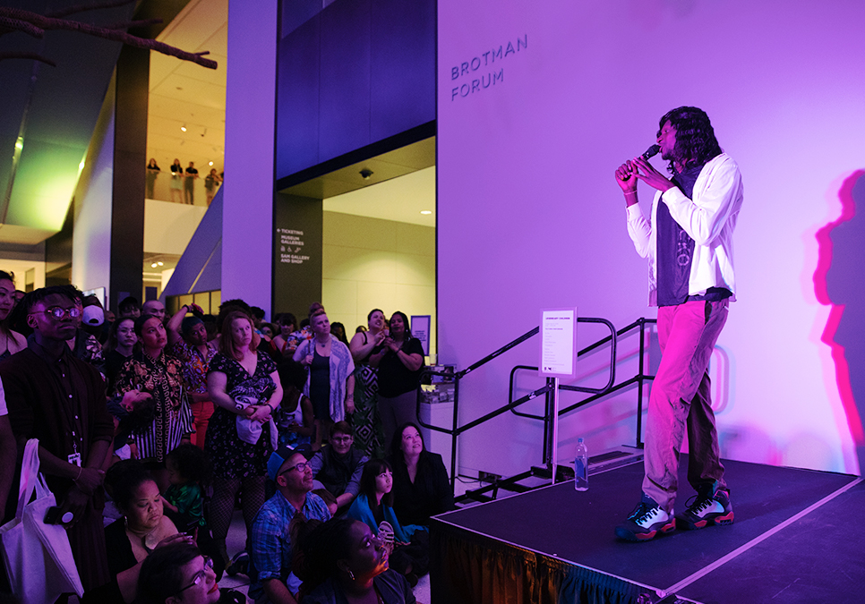 Speaker onstage at legendary children event at the Seattle Art Museum in 2019