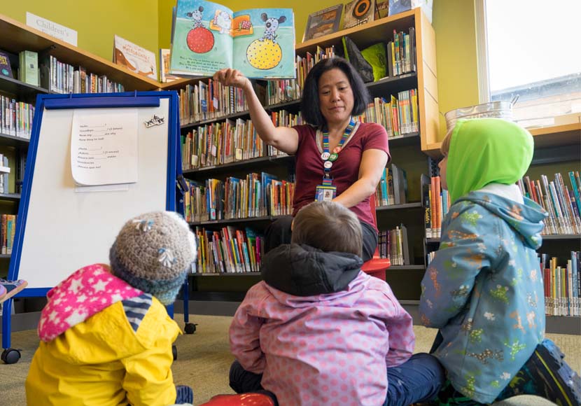 librarian reading story to children